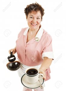 Friendly waitress serving-a hot cup-of coffee for you.jpg